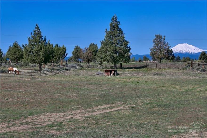 Build your dream home on this quiet & serene pastoral property surrounded by nature. This beautiful location boasts incredible cascade mountain and Pilot Butte views in an area of nice homes. 3 acres of COI irrigation rights and a 1440SF barn to get you started.