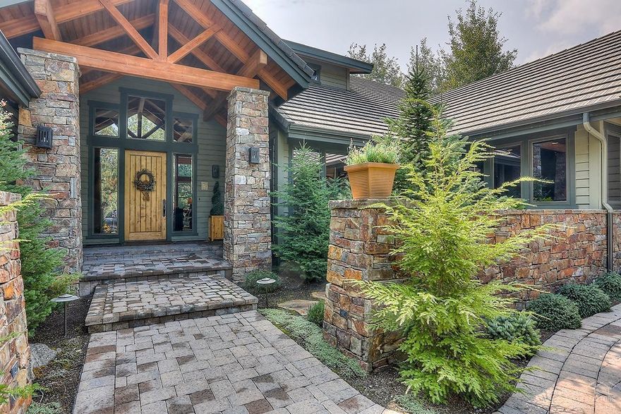 This beautiful immaculate single level custom home builds itself around an entertaining great room, floor to ceiling stack rock fireplace, equipped wet bar, dream kitchen and windows embracing southern exposure covered paver patio. Backyard setting is private yet sits over the 8th hole of Broken Top. The balance of the home has superb bedroom separation, casual and formal dining options, an amazing in home office and cozy den. Wrapped in all the just right finishes with fabulous built-ins.