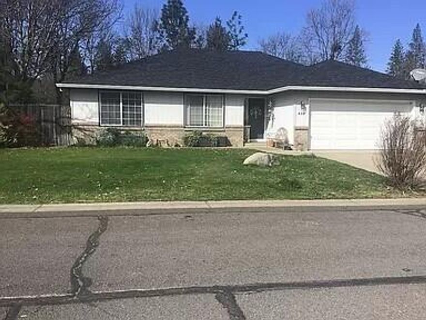 Wonderful home located in beautiful Shady Cove.  This 3 bedroom, 2 bathroom home located on .23 acre with RIVER irrigation and true RV parking is move in ready.  You will be totally impressed with the fresh paint inside, new flooring has just been installed in kitchen, living room, entry, hallway and laundry room.  Roof is 3 years new;  there is a water feature in back yard with mature trees, raised garden beds and large garden shed.  The 2-car garage has built in shelving with a large attic for tons of additional storage.  Master bedroom with en suite, lots of windows and a back door leading to patio.