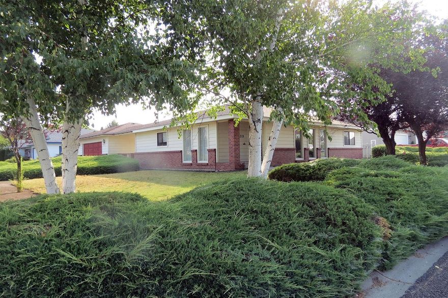 Large 1/4 Acre lot in Sunset Village. Ample room for several RV vehicles. Built in 1985 this home could benefit from some updating but it has a good floor plan with a large great room and sizable formal dining room. The three bedrooms are nice sized and there is an abundance of storage throughout. $205,000.00