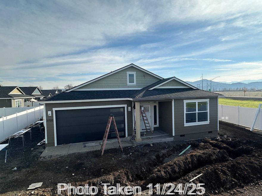 Introducing brand new 2025 high-end construction - built by Bob Fellows Construction, a trusted builder with 30+ years of excellence. Estimation completion is 12/30/25. This remarkable property boasts too many upgrades to list. Step inside & enjoy 9ft ceilings throughout. Split bedroom floor plan offers privacy, w/2 bedrooms & 1 bathroom on one side & a luxurious primary suite w/incredible bathroom on the other. Upgraded vinyl plank flooring throughout the entry, kitchen, living room, hallways, & dining area, complimented by tile in the bathrooms & laundry room, & carpet in bedrooms. The kitchen is a chef's dream, featuring quartzite countertops, huge island, custom cabinets w/soft close, SS whirlpool appliances w/a natural gas oven, upgraded lighting, including under & over cabinet lighting. The primary suite is a sanctuary w/coffered ceilings & a spa-like bathroom w/gorgeous tile, walk-in tile shower, walk-in closet, extra cabinets, +more. Fully fenced & landscaped w/2-car garage.