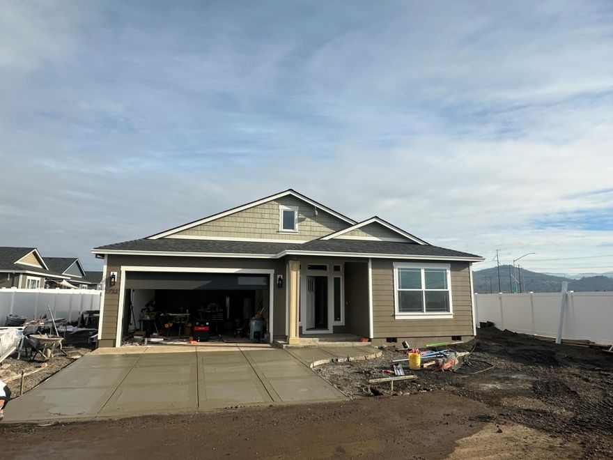 Introducing brand new 2025 high-end construction - built by Bob Fellows Construction, a trusted builder with 30+ years of excellence. Estimation completion is 12/30/25. This remarkable property boasts too many upgrades to list. Step inside & enjoy 9ft ceilings throughout. Split bedroom floor plan offers privacy, w/2 bedrooms & 1 bathroom on one side & a luxurious primary suite w/incredible bathroom on the other. Upgraded vinyl plank flooring throughout the entry, kitchen, living room, hallways, & dining area, complimented by tile in the bathrooms & laundry room, & carpet in bedrooms. The kitchen is a chef's dream, featuring quartzite countertops, huge island, custom cabinets w/soft close, SS whirlpool appliances w/a natural gas oven, upgraded lighting, including under & over cabinet lighting. The primary suite is a sanctuary w/coffered ceilings & a spa-like bathroom w/gorgeous tile, walk-in tile shower, walk-in closet, extra cabinets, +more. Fully fenced & landscaped w/2-car garage.