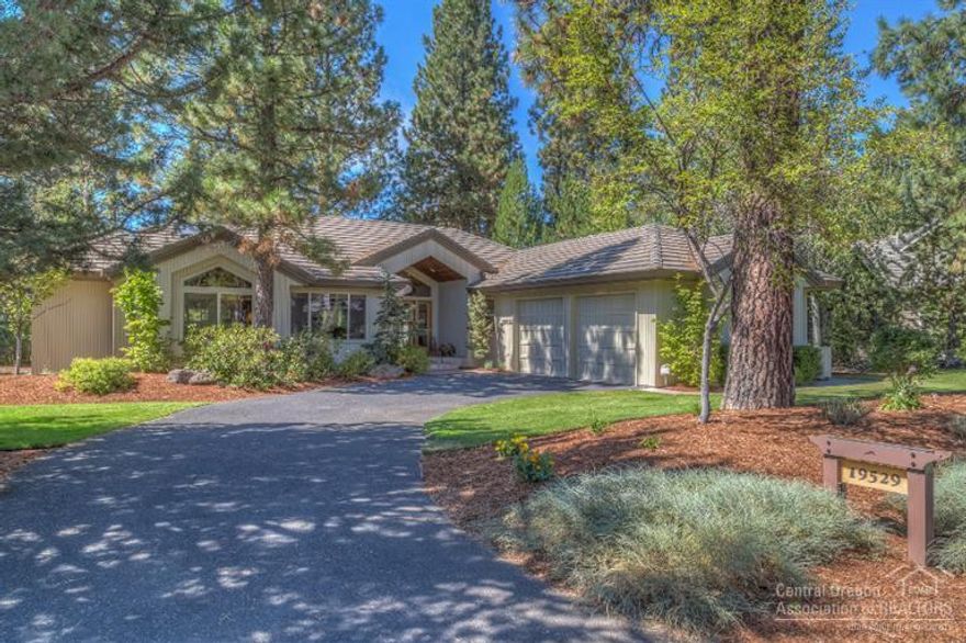 Stylish single level custom home in Broken Top. Open, great room floor plan with large windows facing the un-buildable open space between Broken Top and Tetherow. Features include stone fireplace, cedar ceilings, alder cabinets, tile roof, cedar siding, wood flooring throughout and central A/C. Beautiful master suite with over-sized shower and tub. Large kitchen with Breakfast Island and plenty of storage. Wonderful yard and outdoor space with newly stained deck. Close to parks and river trails.