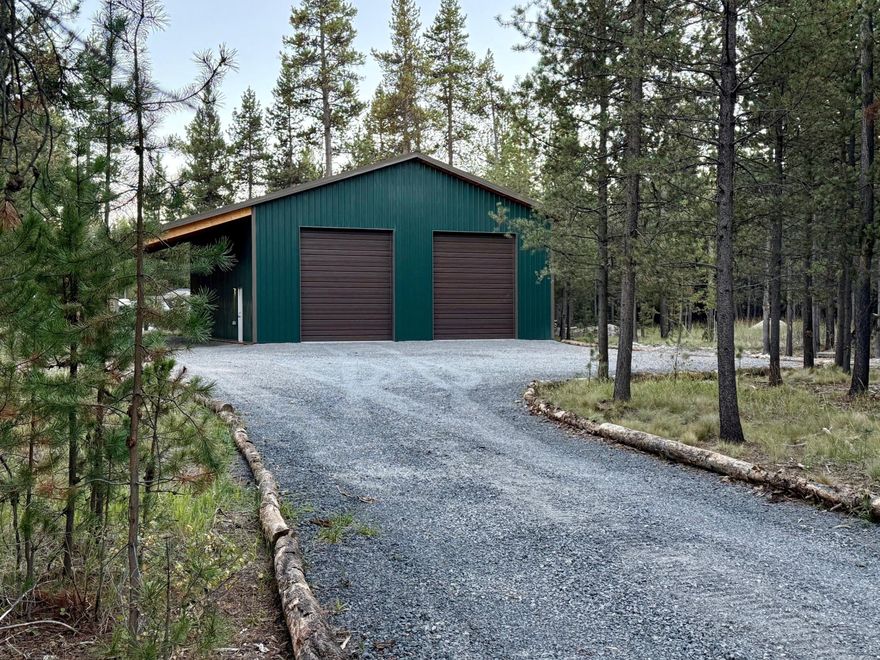 BRAND NEW! Just completed and ready for you. Custom built large shop on recreational lot. 40 x 50 with HUGE 16' overhang and high quality garage door openers. Nicely situated on a half-acre lot with nice trees for privacy. The large driveway is great for getting your RV in or out as well as all the toys. Oversized 16' overhang also gives plenty of additional space. 200-amp service with several outlets, RV plug and welder plug, very bright lighting. Location is great and very close to the deeded boat ramp to throw the paddle boards in, or just enjoy the Big Deschutes River. Close to all the lakes, Mt Bachelor, and the amenities of Sunriver. Have bid to fully insulate with wrap.