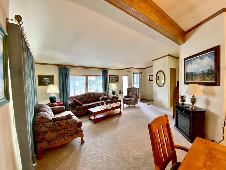 Well maintained home with newer roof and heat pump. Vaulted ceilings with wood beams plus wood trim wrapping around all the many windows and bay windows. Skylights makes this home very bright. Tons of storage. Large master with huge suite, dual vanities, and 4 closets, 3 of which are walk-ins. 2 bedroom, 2 bath. Large office with sliding doors that can easily become 3rd bedroom. Or close off for your private craft room. All appliances included. Low maintenance yard with private enclosed back patio.