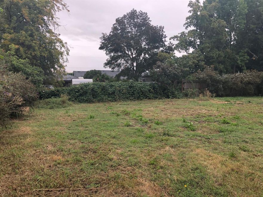 Great Talent Building Lot on a Quiet Lane at the edge of town. Newly partitioned lot is level with CIty utilities to the lot line, easy access on short paved drive. TID rights, mature trees, small storage building on the lot. City says it will accommodate an Accessory Dwelling for extra income or extended family living. Nice spot for a home, spec build, or two-family setup. Adjacent lot also for sale. Not many building lots are available in Talent, this one's ready to go!