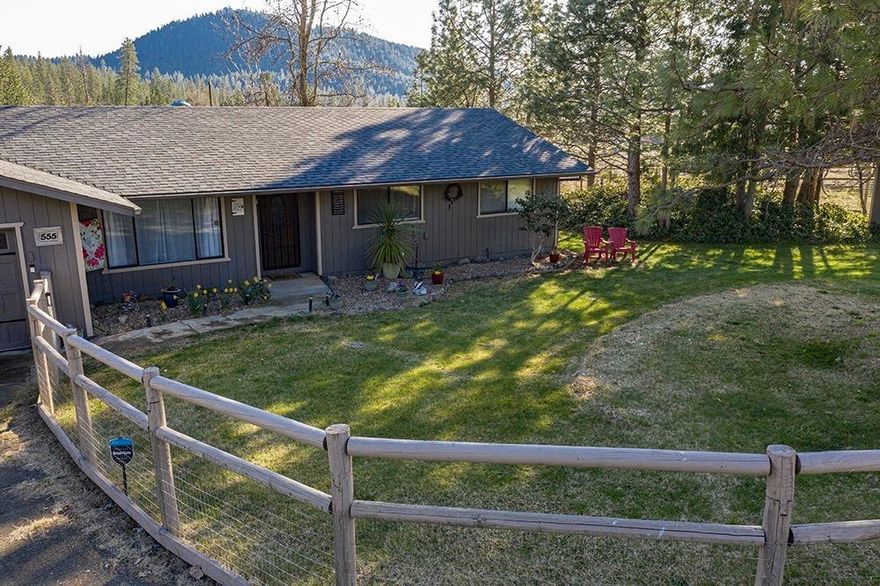 Do you long for a large shop? You will have a 2000 sq.ft. shop with 220 amp service! The 3 bedroom 2 bath home was completely remodeled with a beautiful new kitchen with natural gas stove, new stainless steel appliances and all new cabinetry with pull outs and soft close. There is also a new cultured marble master shower, new flooring, new paint inside and out, new roof, newer furnace, all new duct work, added insulation and a new wood stove that only has to have wood added once a day! There are too many new items to list. The owners planned to live here forever, and put quality craftsmanship into the home, but health issues are forcing them to sell. This property has a raised bed garden area, mature fruit trees, and the 1.4 acres are completely fenced with double rail fencing.