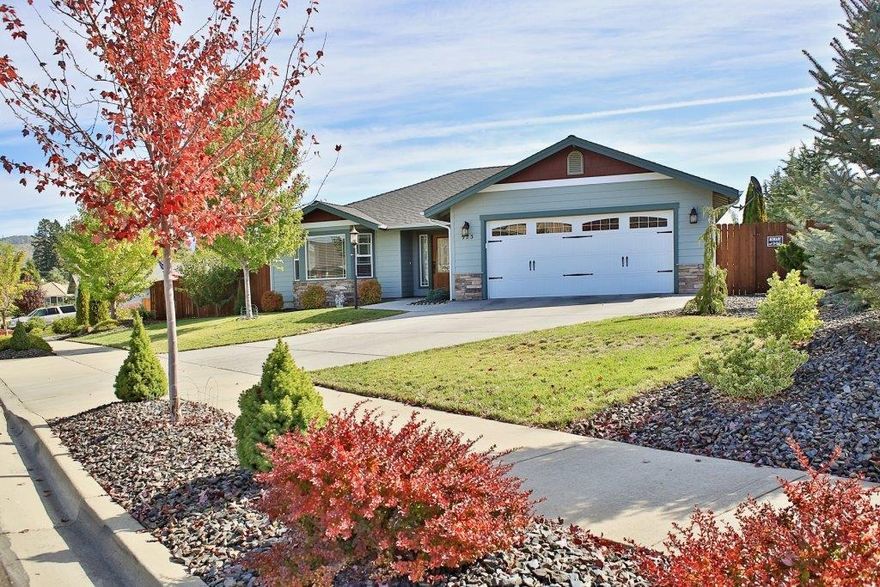 Comfort & elegance can exist in the same house! Beautifully maintained home is inviting & comfortable while still having all the upgraded finishes you are looking for. Featuring 3 beds, 2 baths & 1847 sqft. Built in 2011, the original owner has kept everything pristine. When entering you will notice the massive great room including the entryway with arches, columns & wood floors with tile inlay. Living room has bay windows & gas fireplace. Well-appointed kitchen has beautiful granite counters with tile back splash, stainless appliances, eating bar, pendant lights, pantry & dining area with built-ins. Vaulted & coffered ceilings, recessed lighting, trim work, ceiling fans & extra wide doors and hallways. Split bedroom floor plan provides privacy for all. Spacious Master has walk in closet, door to patio & bath with double sinks & step in shower. Covered front porch, covered back patio, established landscaping on drip systems, oversized garage, laundry room with storage & so much more.