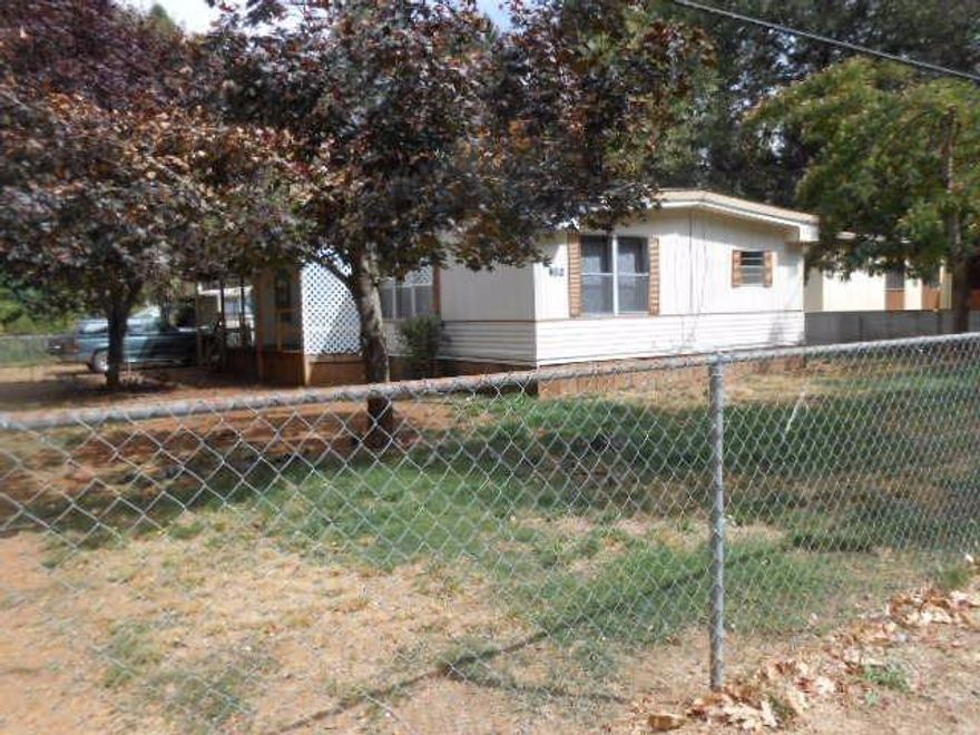 HURRY! BACK ON MARKET due to buyer issues only...HThis fully functional dbl wide home is located on a larger corner lot in the area. Seller continues to make improvements while listed. New carpet in front of home 8/2016. Home is ready for your additional heat source of choice, non-certified stove removed, so add your new pellet or wood stove if you like. Home is a great opportunity for a first time buyer to get into a place. Minutes to downtown area, easy access to recreation and major roads to larger cities. Investors may appreciate due to the need for rentals in this area, potentially. All info deemed reliable not guaranteed