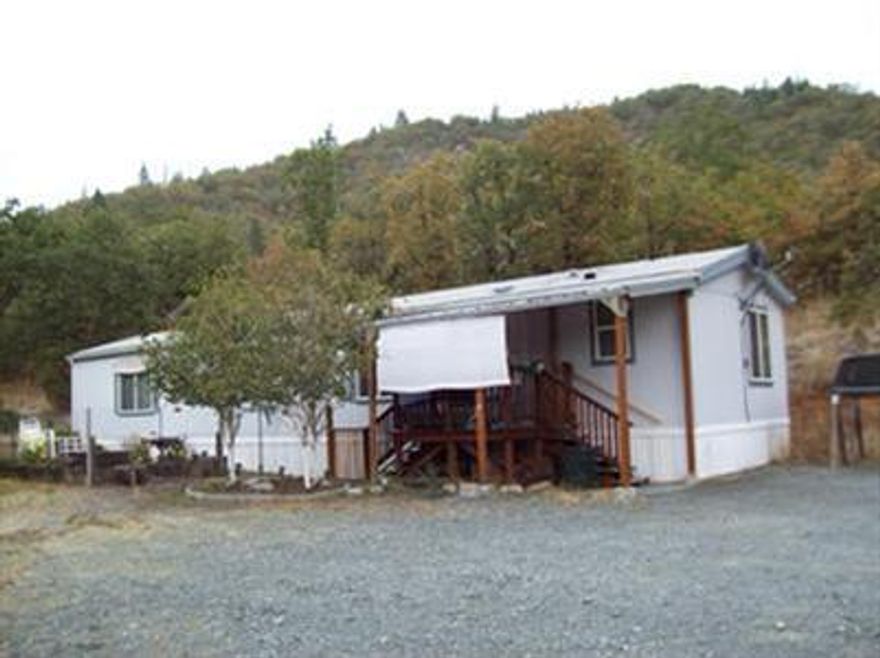 HOME TO BE MOVED! A desirable 16 wide, super good cents manufactured home. Vaulted ceilings, Nice open living area. Kitchen has light oak cabinets, small pantry w/prep island. Bedroom & bath at each end of home. Master suite has walk-in closet w/double doors opening into deluxe bathroom w/relaxing garden tub, mirrored vanity & separate stall shower. Cabinets above washer & dryer. Fiber-cement siding & fiberglass shingled roof. Two small porches & heat pump included in sale. Call for estimates of moving costs.