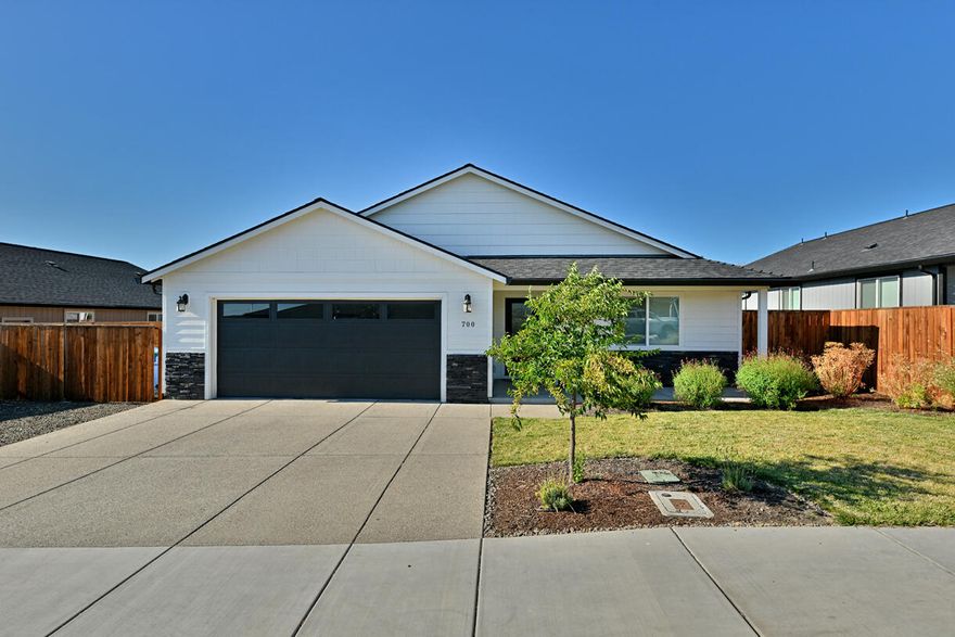 Welcome to this stunning 4-bedroom, 2-bath home built in 2023 with 1,808 sqft of well-designed living space. Thoughtfully upgraded throughout, this home features an open-concept layout, stylish finishes, and a modern kitchen perfect for hosting. The spacious primary suite offers a walk-in closet and private bath. Outside, enjoy a large yard and massive RV parking, ideal for storing your toys or work vehicles. Situated in a desirable neighborhood near local conveniences, this turnkey property offers the perfect balance of comfort, quality, and functionality.