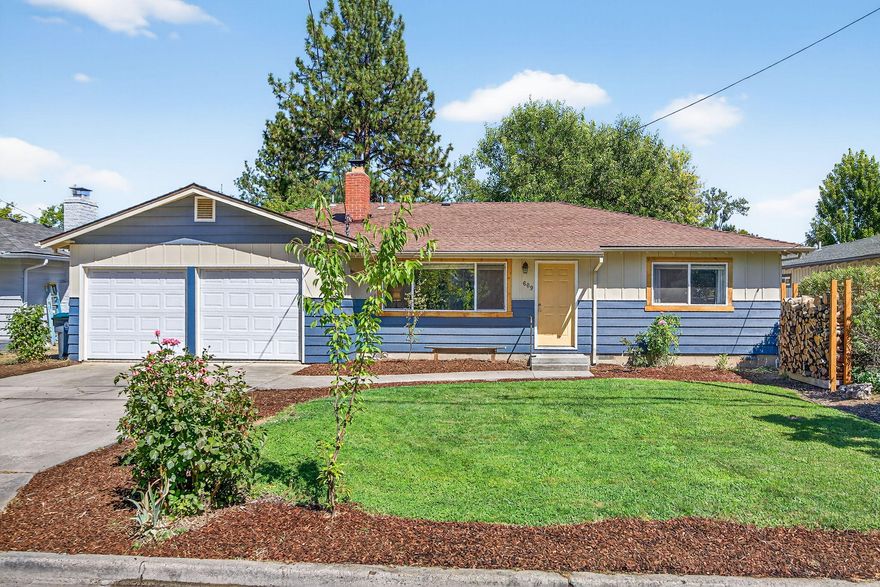 Tucked away on a quiet cul-de-sac near Hoover Elementary, Holmes Park, & local medical facilities, this charming home offers both comfort and convenience.  Featuring beautiful hardwood floors, and cozy carpet in the bedrooms, it also boasts a spacious bonus room off of the kitchen with its own full bath - perfect for a home office, playroom, or guest space.  The huge backyard has raised garden beds, semi covered deck, a chicken coop, and peaceful views of an open field beyond.  With numerous thoughtful upgrades throughout, this home is ready for you to move in and start making memories,