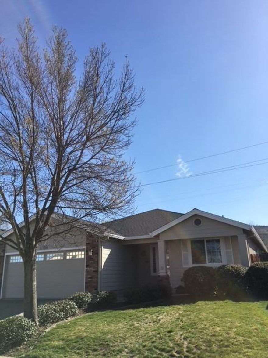 Great East Medford location !!! Great price tag on this 2002 Pac Trend built home. This home features a large great room area with vaulted ceilings, very open and bright floor plan, large kitchen, covered front porch and back patio, finished garage, walk in closet in master, clean and well cared for, professional landscaping, and more.