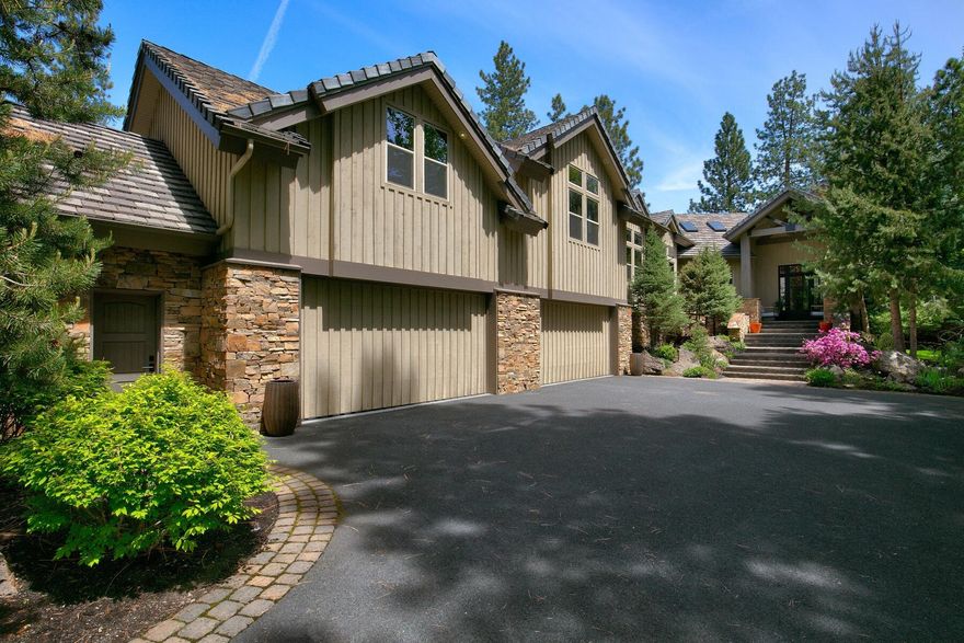 One of the most incredible settings in the sought-after community of Broken Top. This stunning home backs to a wooded glen and overlooks the 1st hole on the golf course.
Recently updated and upgraded in nearly every way. The Great Room design opens to high ceilings with exposed timber trusses, a stone fireplace, and a wall of glass doors leading to the patio. Custom finishes seamlessly connect each space with mountain-modern style. An intentionally re-designed kitchen with a 10ft island, professional appliances, opens to the lofty dining space & the outdoors. The primary suite lives like a spa retreat & also opens to the patio & in-ground hot tub. There's a Cinema/Media room & a Private Office. Step into the Wine Suite for sipping and relaxation time. Enjoy endless walking & biking paths, swimming
pool & pickle ball. Just a few of Broken Top's many amenities. Join the private club for the golf experience. This peaceful gated community is near NW schools, dining & Mt Bachelor.