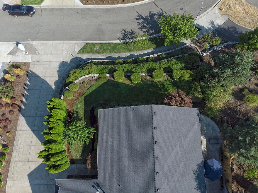 Located in Crystal Heights subdivision with amazing views of Roxy Ann & the East Hills. Custom built 3492 sq. ft. 3 bedroom/3 full bath. The home is move in ready. The seller recently purchased for his daughter to relocate to the area and career plans changed and is moving elsewhere. The recent upgrades include. New light fixtures, new interior paint. Enclosed side patio is with partial new fencing. New refrigerator, washer & dryer. Situated on a large .59 acre lot with 3 car attached garage and detached 1616 sq. ft. 2 car garage/shop. There is additional room above the shop which could be converted to an ADU or kept as additional storage. Great open floorplan with large loft area on upper level with 3rd bedroom & bath. Large master suite is  on the main level, Gas fire place has beautiful  floor to ceiling brick accents with wooden mantle. Beautifully landscaped with sprinkler / drip system.  This home is reasonably priced at only $203 a sq. ft. Don't miss out on this excellent value!