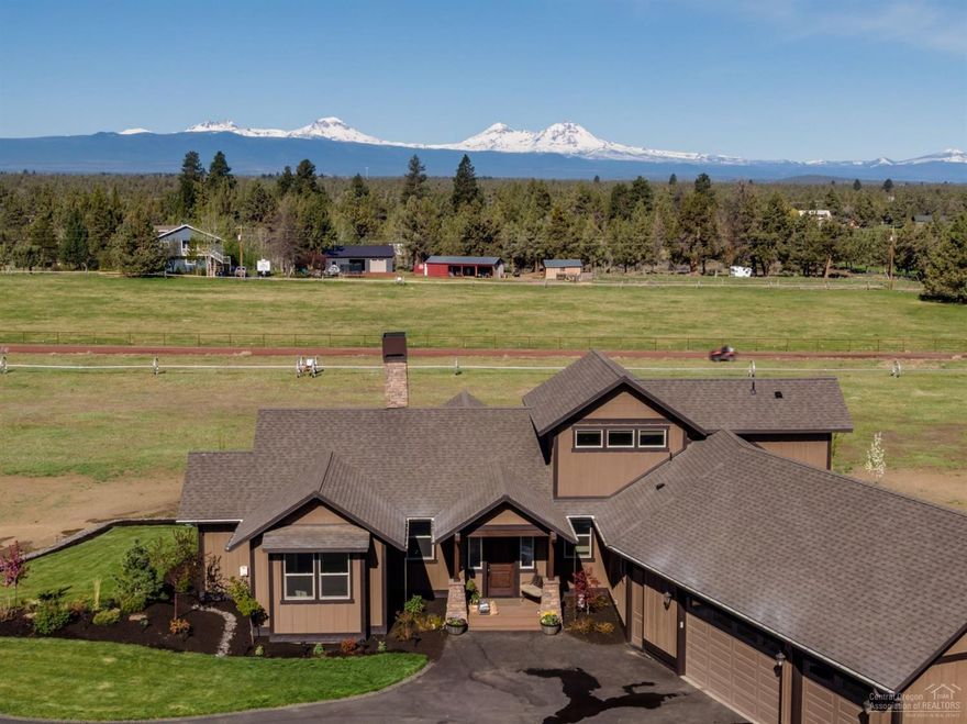 Spectacular Mountain Views, Close to Town, newly constructed Northwest style Custom Home, Gourmet Kitchen, High-end finishes- SS appliances, Granite, Hardwood, Tile, Bonus room (4th bedroom suite). Gas assist wood burning Fireplace, Lush landscaping w/ auto sprinklers, composite deck. Over-sized 3 car garage, Detached Shop w/ 10' door, hangout loft & full bath. Plenty of room for horses or ? w/ 3 acres of Irrigation, horse shelter, small corral & chute, would make a perfect Hobby Farm! Great Location!