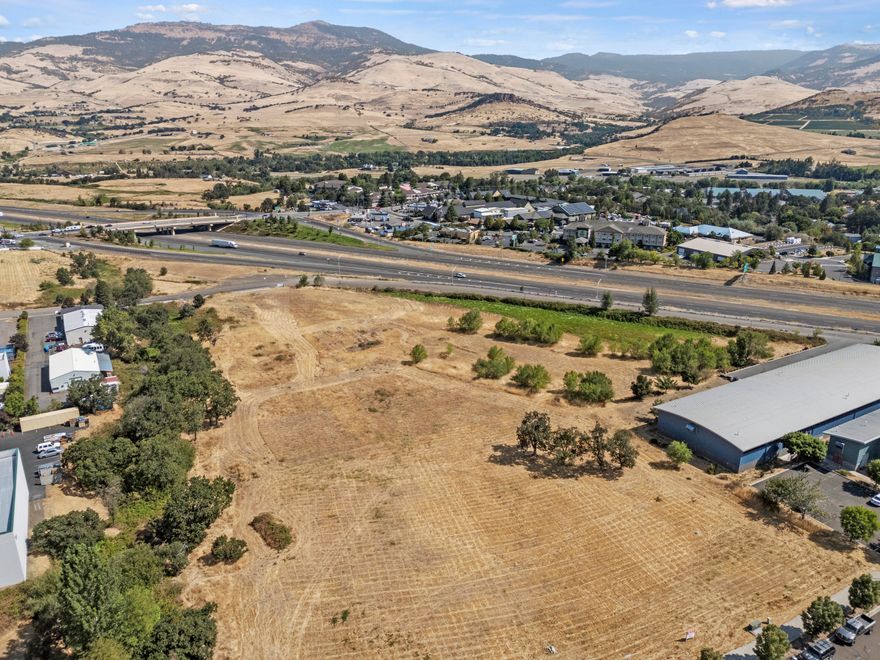 Shovel ready building site with 6.01 acres with approval for over 67,000 square feet of commercial space by the City of Ashland. All street improvements for the first phase of this project have been completed. Available for land acquisition, build to suit or lease. Listing broker, partial owner.