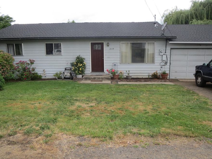 Lots of updates...6 month old roof, new vinyl flooring, new carpet, granite counters in kitchen and new interior paint. New Stove and Hot Water Heater. Large family room with tongue/groove ceiling and Blaze King certified wood insert. Living room opens to dining area. Kitchen is roomy with good cupboard space. Indoor laundry room with deep utility sink and half bath. Large back yard with covered patio is accessible from both family room and dining area. Convenient access to schools and shopping. Good starter home or rental property.