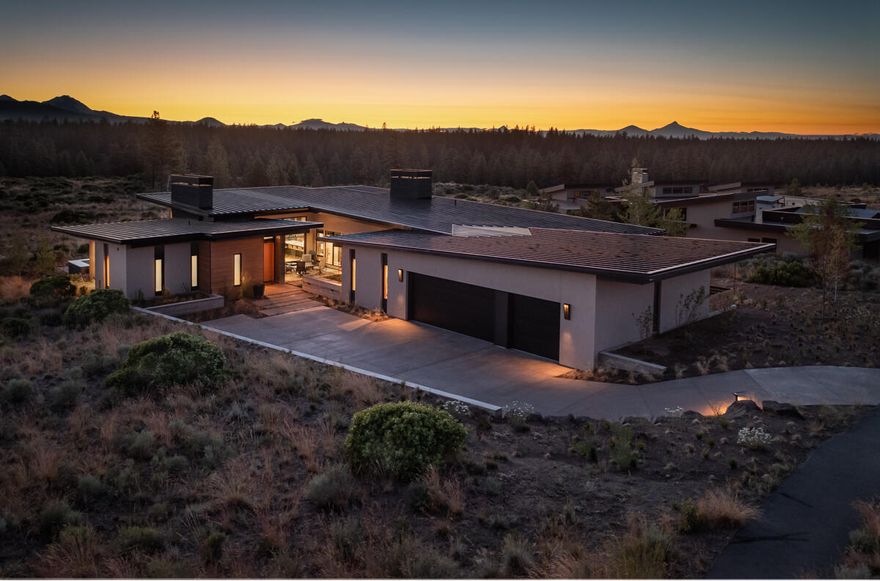 Positioned just above Shevlin Park with spectacular Cascade Peak views, this one-of-a-kind custom refuge combines extraordinary attention to detail with an exceptionally scenic & private setting. From the western wall of the open concept living area, protected green space stretches up to the panoramic view, while the interior space offers an effortless flow from the gathering space with gas fireplace to the uber-efficient kitchen with oversized island, double oven Wolf gas range & built-in Miele coffee station. Thoughtfully designed spaces fill the home from a view facing primary suite with sauna to a mirror tiled whiskey room, additional ensuite bedroom, workout room, office & interior courtyard. Sophisticated systems enhance comfort at every turn including radiant floor heating, built-in hot tub, newly installed solar panels, backup generator, plus automated control of temperature, lighting & window coverings. An exceptional home in a one-of-a-kind a setting.