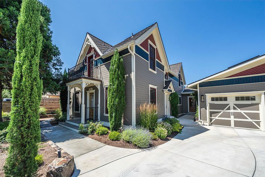 Stunningly renovated craftsman home with high-end modern finishes, located within a flat mile of Ashland's downtown. Seamless addition by Advantage Homes in 2017 added over 1,300 square feet of living area to the main level. Quality amenities include Brazilian Cherry flooring, plaster interior walls, designer lighting, solid-core doors, custom cabinetry and built-ins, composite decks, and view balconies. Kitchen equipped with granite counters, island, eating bar, pantry, Wolf range with dual ovens, stainless appliances, and farmhouse cast iron sink. Main level features a family room, office, living room with gas fireplace, two bedrooms, a jack-and-jill bath, and two half-baths. Upstairs master with fireplace, vaulted ceilings, private terrace, expansive wardrobes, en-suite bath with two separate vanities, stone tile, cast iron soaking tub, and shower with skylight. Landscaped grounds, mature trees, rock fountain, terraced gardens, lawn, and poured concrete patio with gas firepit.