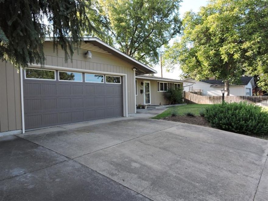 Turn key ready home. Open floor plan between kitchen, living room and den. Vaulted ceiling in living room. Recently painted and both full baths recently updated with new fixtures and flooring. New carpet. Newer gar furnace.. Gas fireplace in den. Large corner lot with covered carport and RV parking. New garage door. Sprinkler system in front yard. In ground swimming pool. Nice home!