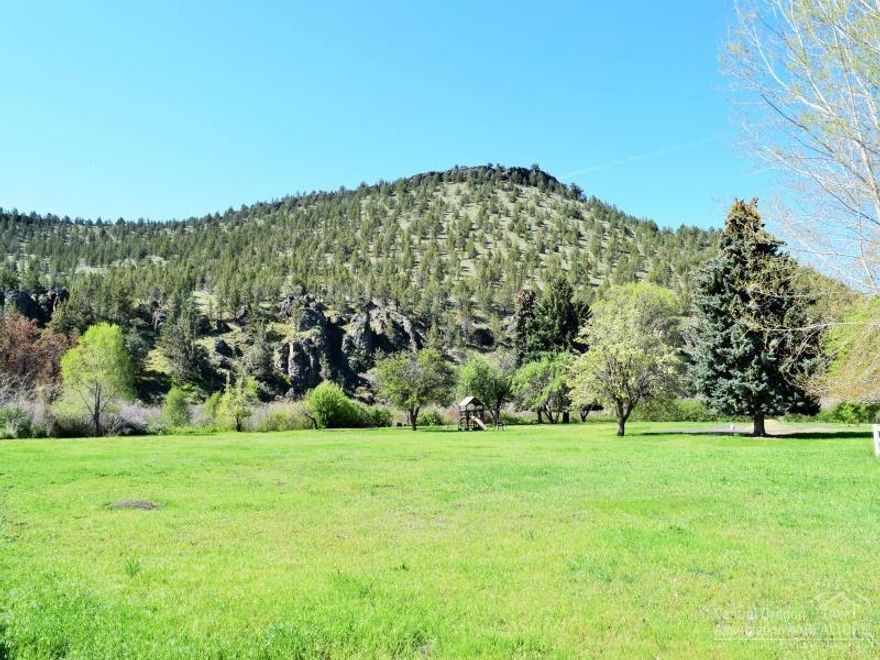 OCHOCO CREEK, home to native Redband Trout, flows right past this amazing 2.44 acres. Build your dream home and enjoy gorgeous sunsets over the Cascade Mountains and sunrises over the Ochoco Mountains. Walk out your back door and start fishing from your own property! Watch hawks, eagles and deer. Fruit and mature fir trees. Golf course is close enough to drive your cart right to the club house! Less than 10 min from Ochoco Reservoir where you can waterski, fish & swim. Power & water are at the paved street