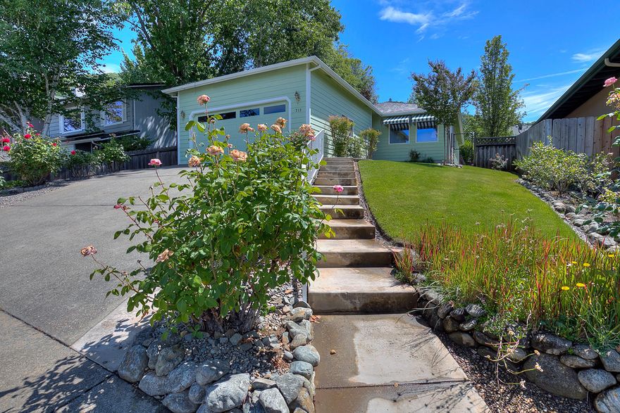 LOCATION, LOCATION, LOCATION. Beautifully maintained home in town. This home has immaculate landscaping all on timers and a water feature Koi pond in the back yard. The home is clean and bright with 3 good size bedrooms and 2 bathrooms. Kitchen has been remodeled in last 10 years and outside has been painted in the last 3 years. New garage door was install in 2019. Do you like Blueberries? There are 5 blooming blueberries plants in the yard. Enjoy!
Buyer to do their own due diligence.