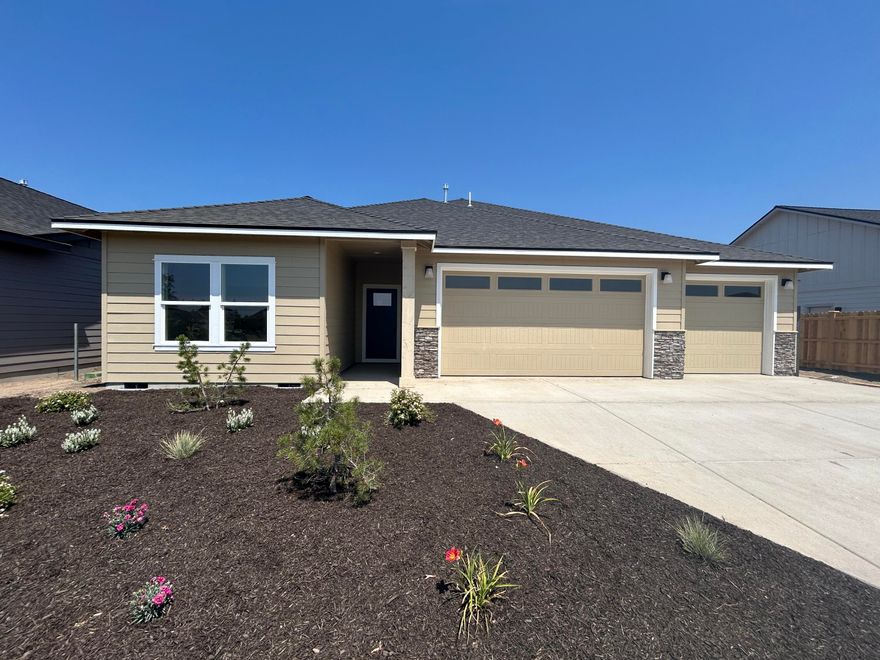 Est. completion early August! Lot 24 features the Hamilton floorplan w/ 2,205 sf of single-level living; 3 bdrms + den, 2 1/2 baths, 3 car garage & RV/boat parking & entrance gate. A vaulted primary bdrm features an XL walk-in closet, bath w/dual vanity & shower w/ great separation from 2 guest bedrooms sharing a full bathroom. Entertain in your kitchen w/ SS appliances, tiled backsplash, soft-close cabinets, pantry, extensive slab quartz countertops opening to the dining area & great room w/ decorative gas burning fireplace. A utility/laundry room too! Durable laminate plank flooring thru-out & carpeted bdrms. Covered back patio, fenced yard & landscaping w/ sprinklers. Upgraded finishes & A/C included! Korbin Meadows is a new community in desirable neighborhood of SW Redmond touting Cascade Mtn views. *Floorplan & rendering subject to change. Interior & exterior finishes, lighting package will vary. Photos of similar (Summit) floorplan.