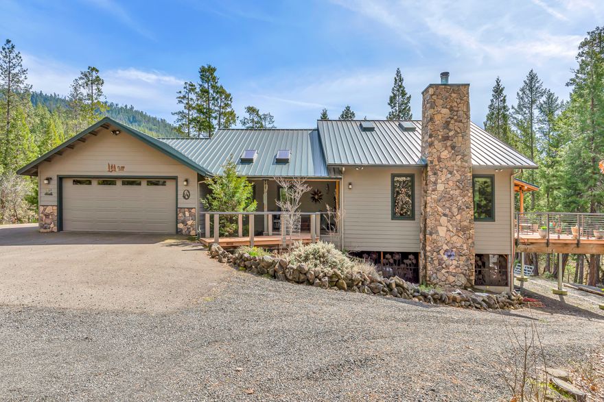 Discover an extraordinary ranch spanning 20 irrigated acres with Big Butte Creek frontage and BLM land across the creek. This exceptional Northwest home blends luxury and functionality with an innovative geothermal heating/cooling system and a robust generator ensuring uninterrupted comfort. The spacious 5-bedroom home features luxurious heated tile floors in the master bedroom, walk in closets, elegant tile shower with soaking tub. With Stunning knotty hickory cabinets and doors throughout, this custom home offers everything. You'll enjoy the private deck off the kitchen with sounds of the creek rambling below.   An oversized garage and a massive 25 x 35 insulated shop provide ample space for vehicles, equipment, and workspace. The property offers a nice pond, large meadow, towering trees and natural beauty.  Creating an ideal retreat for those seeking privacy, efficiency, and breathtaking landscape views. Careful, once you tour this home, you won't want to leave.  Oregon Dream!