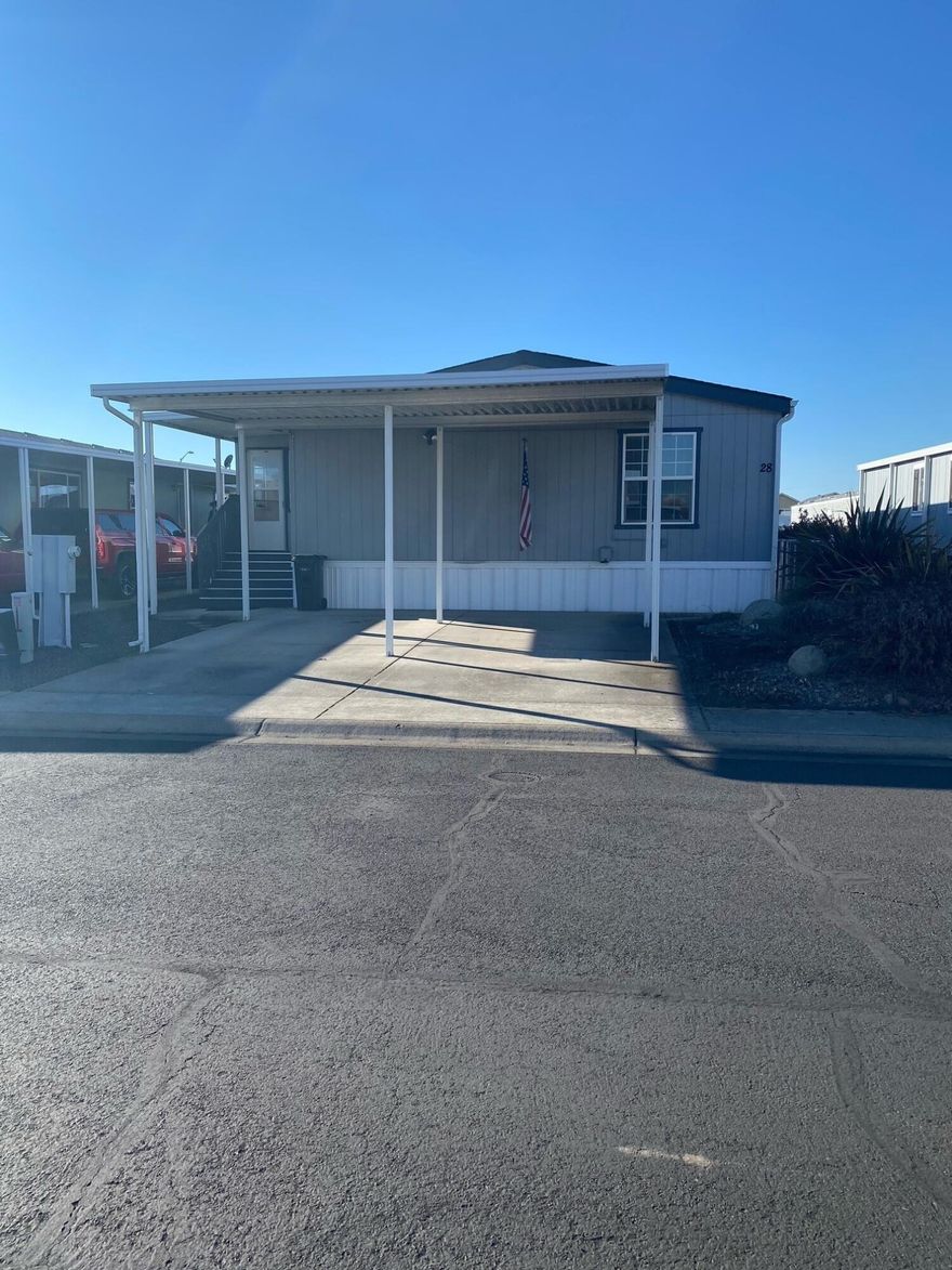 Amazing Opportunity. Well kept mobile in 55+ community. Set up with ramp for access. Split floor plan with large living room. Must tour to appreciate the home.