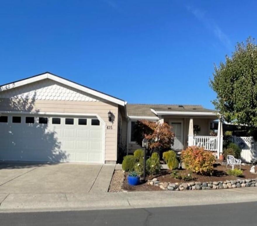 Back on the market no fault of the home.55+ Community has an opening for you! Corner Lot. Open concept w/gas fireplace, built-in large hutch, a peninsula great for setting out charcuteries, dining area and plenty of cabinets with lots of storage in kitchen. 2bdr. /2bth-split floorplan w/3 room for office/den/crafts etc.  Upgrades throughout.  Laminate, carpet and vinyl.  Relax on the side covered patio with privacy curtains or on the back patio area for your Zen moments. Covered deck in the front to enjoy your morning coffee and perhaps a chat with the neighbors. Easy care yard with drip system and sprinklers.  Large window for lots of natural light, solar tubes and ceiling fans.  Oversized 2 car garage with storage. Private Park on Griffin Creek for homeowners/guests only.  Awesome events held for the homeowners throughout the year.   1 yr. Home Warranty proved by the seller.  Buyer to do all due diligence on the home and Park Rules.