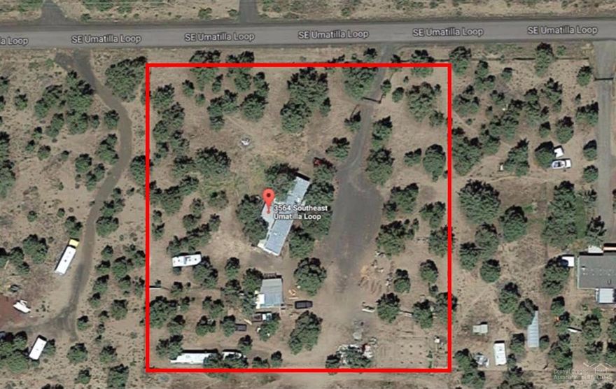Nearly 2 acres conveniently located on a paved road in Prineville Lake Acres. This property is flat, private, fully fenced and comes with a tenant in place that would love to stay! Older single wide with additions is not finance-able & sold as is. Property has power, septic, shared well & several outbuildings. RV pad & hookups too! Keep it as an income property or build your dream home & shop here!