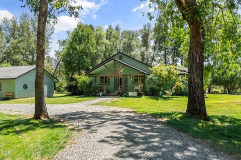 Photo of 191 River Grove Drive, Cave Junction, OR 97523 (MLS # 220229118)