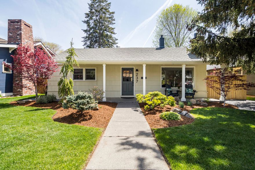 Mid-century modern meets historical charm in a perfect Bend location! Nestled between Downtown & the Box Factory w/easy access to 97, this meticulously cared for home boasts original hardwood floors & custom touches throughout. The kitchen has been recently updated to include brand-new cabinetry, butcher block countertops & tile backsplash. The dining room flows into the living room which has a gas fireplace w/white tile & custom teak shelving. The primary bedroom features a luxurious custom tile shower & walk-in cedar closet. The other two bedrooms are set in the rear of the home next to the second newly-updated bathroom. The fully fenced in backyard has patio space & is nicely landscaped, perfect for entertaining. The 520SF garage (ADU project?) includes newly installed garage doors. This home also has smart home features, basement space not included in the SF & a graveled parking area w/space for RV/boat etc. This home has location, design and opportunity rolled into one!