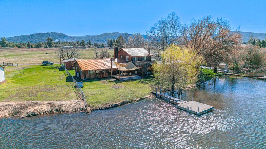 Beautiful riverfront home with a new deep-water dock on the Williamson River. This 3 bed, 2.5 bath retreat sits on 100 feet of prime frontage, perfect for boating, kayaking, and swimming. Make your home an investment.  
Whether as a full-time residence, vacation home, or Airbnb rental, this property delivers both lifestyle and investment value.   Just 25 minutes from Crater Lake National Park and Klamath Falls, it's an ideal short-term rental (STR) or VRBO.
Upgrades include luxury vinyl plank flooring, new vinyl windows and doors, a durable metal roof, and a new HVAC system for year-round comfort. The kitchen flows onto a new deck overlooking the river—perfect for entertaining, relaxing, or hosting guests.
A rare opportunity to own a stylish riverfront escape with strong short-term rental potential and direct access to one of Oregon's most scenic waterways.