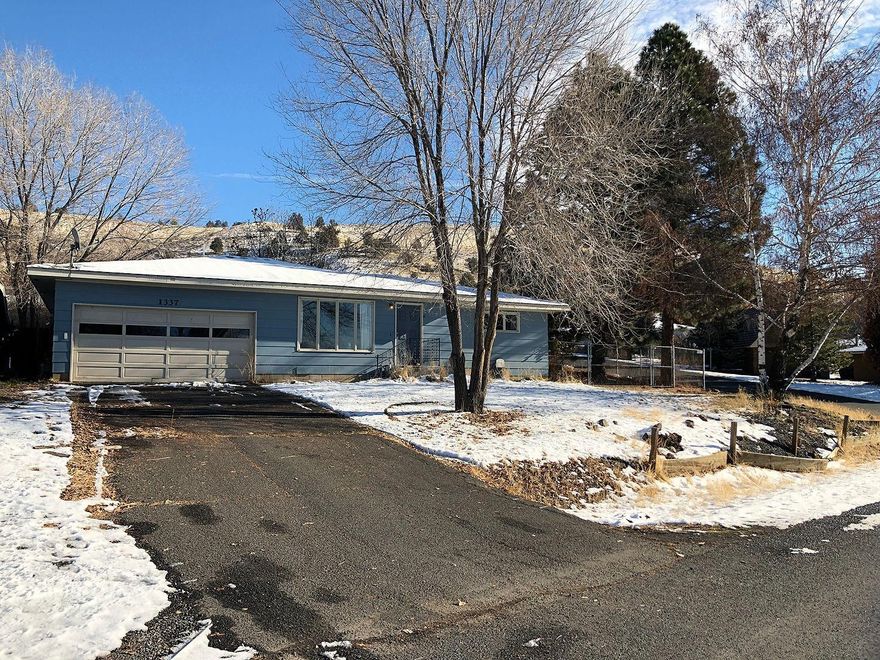 Great Moyina Heights home sits on a corner with mature landscaping lot, full fencing on the back yard and storage shed. With mature landscaping. Home offers an attached 2 car garage with storage shelving, large common areas, 2 large bedrooms and 2 full baths. Mather bedroom has 2 closets and master bath. Very spacious dining room with pantry closet, this area is so big that it could be a great room plus dining area. Kitchen is open to the dining. Off the kitchen is a sun room which makes for a cozy place to read with natural light. Mudroom and laundry area is off the attached garage. New furnace and A/C, heat pump was installed in 2015. Home features casement wood windows, new flooring in master bedroom and main bathroom.