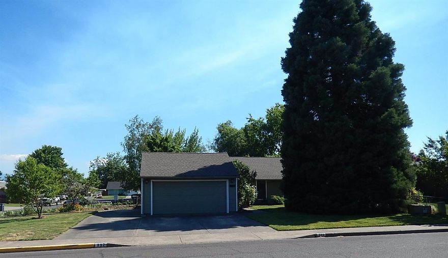 Don't miss out on this great well-maintained home! Big corner lot includes large garden area, privacy-fenced yard, covered patio in back, private concrete courtyard patio between house and garage. Large 40' RV Parking, Mature landscaping with nice shade trees. All new paint on exterior. Big living room with vaulted ceiling. Spacious well-appointed kitchen with tiled countertops and breakfast bar. ALL appliances stay! Even washer & dryer. Large Master Suite with walk-in closet and attached bath. Inside laundry. This home is immaculate and move-in ready! Go to: http://892HopkinsRoad.utour.me for virtual tour.