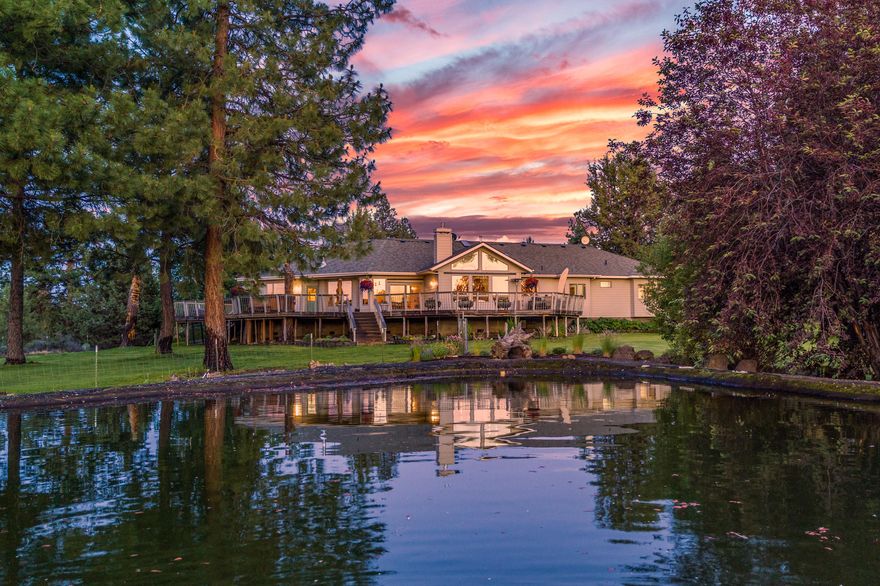 A once in a lifetime property that has been thoughtfully updated! A curving driveway leads to your own private acreage retreat backing to national forest. This mostly single level 4,541sf custom home on 19+ acres with 4.05 acres of irrigation features a massive chef's kitchen with Miele appliances, a 6-burner gas cooktop, island and eating bar that opens to a family room & dining area. The formal dining & living room showcase a home that is designed to entertain. The large primary suite features two closets, a large jetted soaker tub & gas fireplace. Down the private hall are three en-suite bedrooms and an oversized laundry room. Above the 3-car garage, sits a large bonus room with half bath perfect for the kids, hobbies or home office. High quality build home with new quartz counters, tile backsplash, fresh paint, all new lighting fixtures and a new roof. The large finished shop has RV parking, tons of storage and bonus room. Perfect for horses, hiking and mountain biking!