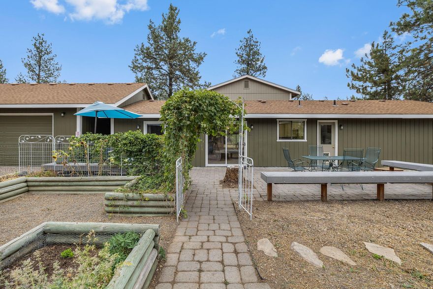 Discover your private retreat in Indian Ford Meadows! This 6.7-acre horse property offers a peaceful setting while being just minutes from downtown Sisters. The home features 5 bedrooms, 4 full baths, and a spacious great room with bay windows that bring in natural light. Step outside to a large patio perfect for entertaining or gardening. Equestrian facilities include a barn, covered hay storage, corrals, and full fencing. Enjoy the quiet beauty of the neighborhood along with convenient access to Sisters' charming shops, dining, and year-round events. Outdoor recreation is at your doorstep—skiing at Hoodoo, fishing on the Metolius, and endless hiking and biking trails. A rare opportunity to own a horse property in one of Sisters' most sought-after areas.