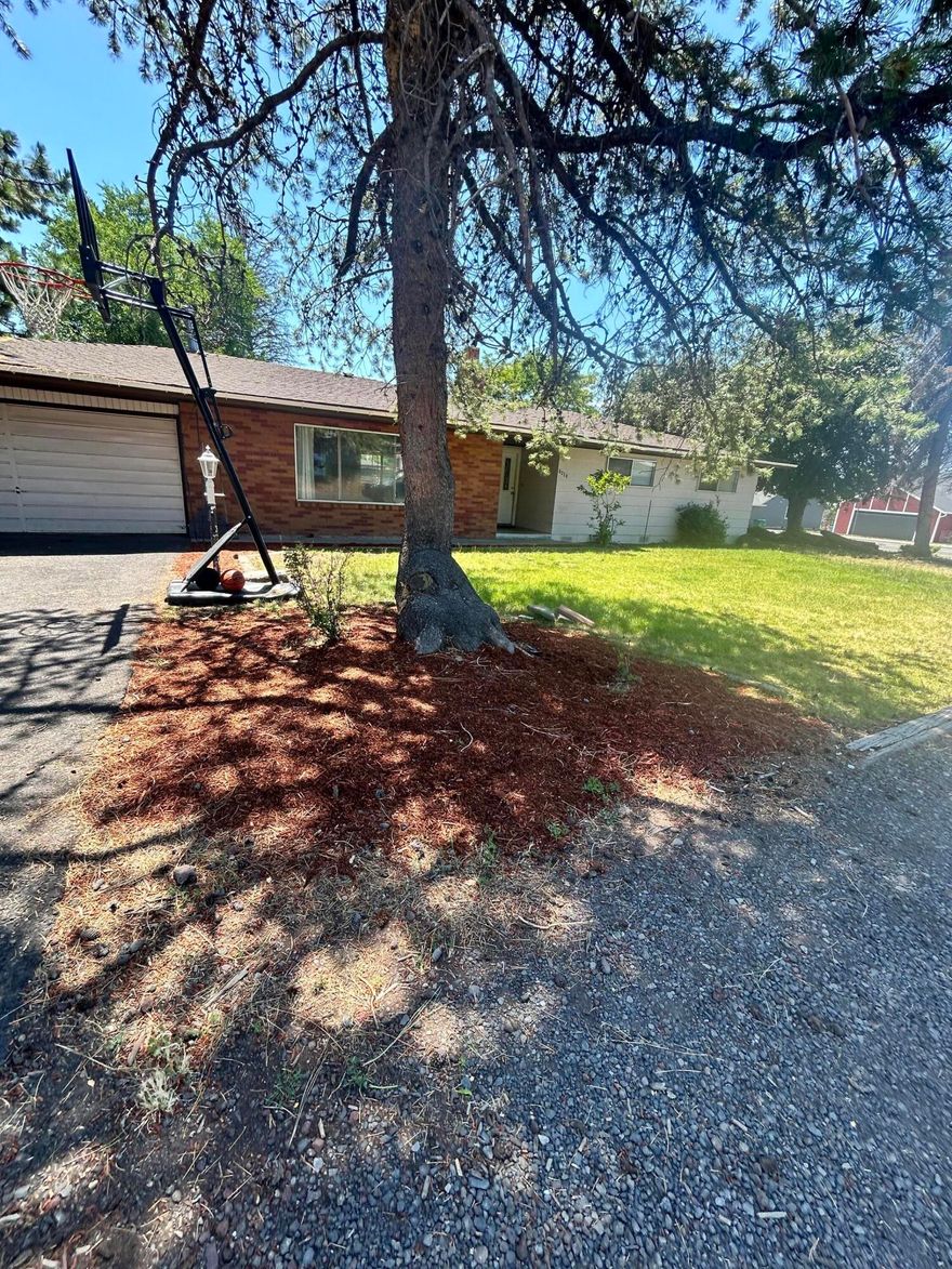 Located in the desirable Henley school zone, this 4 bedroom, 2 bathroom home sits on a spacious corner lot in a family-friendly neighborhood. It has recent updates throughout, including a brand new AC and furnace with a WiFi-enabled thermostat. The backyard is large with mature fruit trees, and the side area offers space for RV parking. This home is move-in ready and offers comfort inside and out. Sellers are moving and are very motivated!