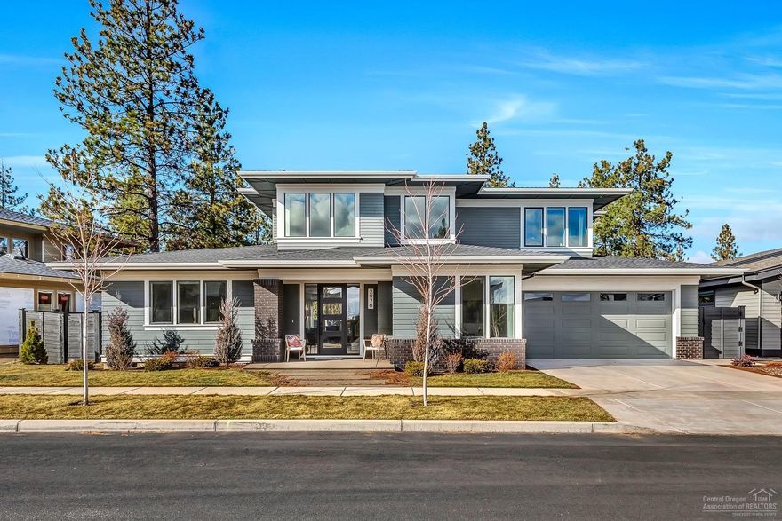 Breathtaking like-new home on the prestigious Celilo Drive, affording privacy & convenience in Northwest Crossing! This open floor plan features designer finishes throughout. Main-level office or upstairs bonus room could be used as 4th bedroom. This stunning home also features a main-level master, gourmet kitchen with stainless appliances & dual beverage refrigerators, 3-car tandem garage w/polished concrete floor, covered patio w/wired speakers, fully fenced & landscaped backyard w/hot tub, high-end window coverings and so much more! Better than new & one you don't want to miss out on!