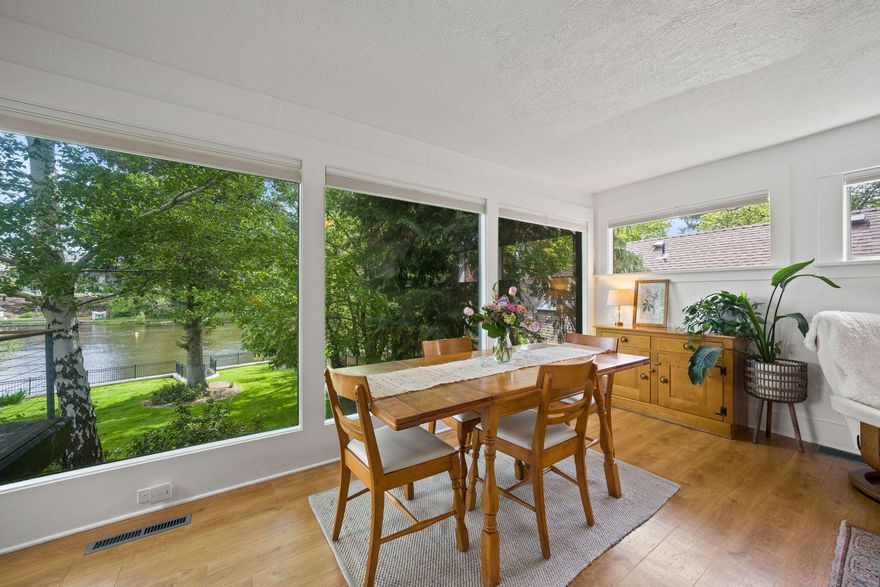 We bought this home to be on the river, to grow our family & to build our dream. Waking to the sound of water & walking to First Street Rapids, Pioneer Park, & downtown Bend became part of our everyday joy. We've loved the convenience—paddling from our backyard, strolling to music, grabbing coffee or dinner without ever needing a car. The home itself blends charm & comfort w/ thoughtful updates like Viking appliances & warm, inviting layout. Set on a rare .31-acre RM-zoned riverfront lot, it also offers incredible future potential. We secured an approved plan for a major remodel so your dream riverfront expansion or investment is already in motion. Living here has been more than a home—it's been a lifestyle of connection, peace & inspiration. This is a property for buyers who dream not just of living in Bend, but of living w/ Bend—Immersed in the water's rhythm, surrounded by the authenticity of an established neighborhood & connected to the quiet, enduring heartbeat of the river.