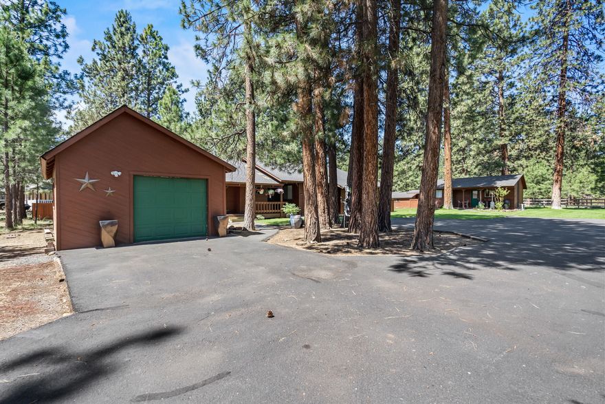 Attractive home approx 1 mile from the lovely town of Sisters. Wonderful .56 of an acre to sprawl out on while enjoying the huge newer deck. This 2 bedroom 1.5 bath lives large due to a great floor plan and vaulted ceilings! Also the property has a great income potential with an additional approx 400 sq. ft. bunk house equipped with a king sized 1 bedroom, full bath, and kitchen. Lots of storage in the 2 stall small barn, plus RV hook up and parking. Irrigation system too!