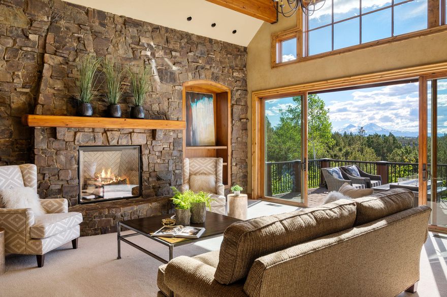 Located in the heart of Tumalo, this park-like oasis on 5+ acres, features a stunning home, 3100 sq ft Shop/RV garage, an expansive yard w/ a covered BBQ area for entertaining, a
serene pond and fenced pastures. Designed for multigenerational living, this 5-bedroom
home boasts seamless main level living w/elevator. The primary wing features a spa-
like suite, an expansive closet, and a dedicated office. A full BBQ kitchen adorns the heated patio. There's a fully equipped guest wing, fitness/workout room, and private theater, Experience the epitome of refined living in Deschutes River Ranch w/ hundreds of acres of unparalleled amenities: fishing, the river trail, horseback riding trails that access public land, recreation buildings, and much more. An additional 11 acres can be purchased if the buyer desires! Seller Carry Option Available.