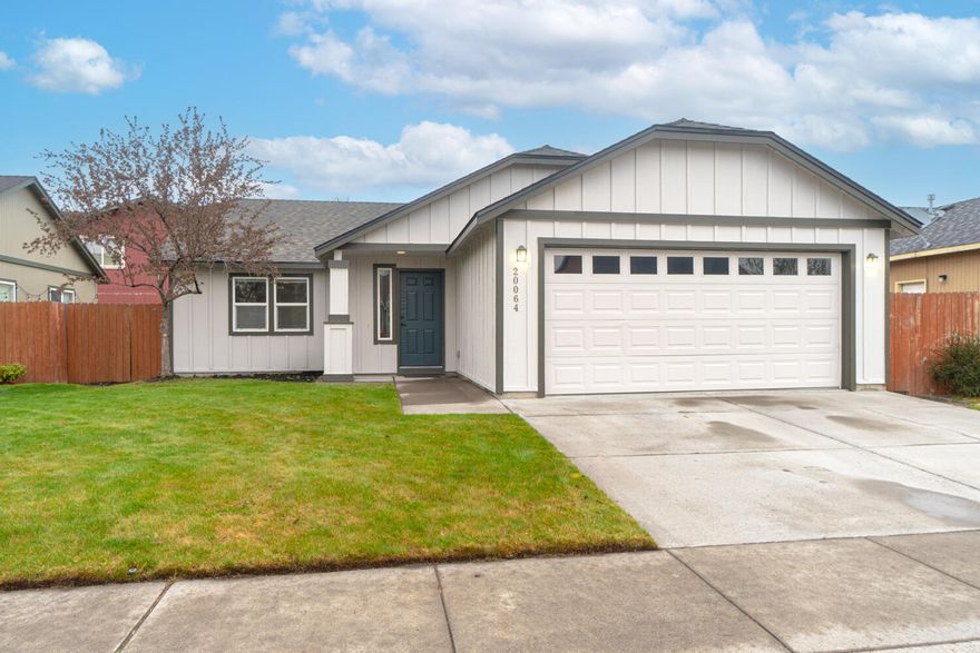 Don't miss this well maintained three bed, two bath home located minutes from the Old Mill & all that Bend has to offer! Home features open concept living plan w/vaulted ceilings, tiled entryway & an abundance of natural light throughout. Open kitchen space w/breakfast bar seating, tons of counter space, floating island w/small dining table pull out feature, & plenty of cabinet storage. Dining area has a small pantry & sliding glass doors that lead outside. Well sized primary bedroom w/tub & shower combo. Two additional bedrooms share a full bath as well. New roof & exterior paint! Head downtown & check out the local shops, grab dinner, or catch a show at the historic Tower Theater. Endless trails, world-class skiing, parks, beautiful lakes & rivers. There's always an adventure waiting just outside your door when you call Bend home!