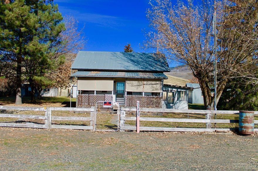 Open concept, 2 bed 1 bath home! The property has a large yard, covered patio, irrigation well and lots of storage! There is another home on the premises, its a fixer upper and being used as storage. This sale includes 4 tax lots totaling .74 acres!