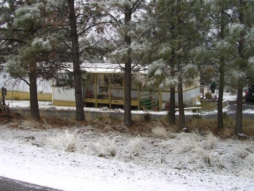 Build your dream home & enjoy all the Crooked River Ranch has to offer! The wildlife, golf, swimming, tennis, hiking, fishing & rich community life. Level gravel driveway, mature trees w/native landscape and backyard lawn. This property is being sold as Bare Land with an AS IS 1974 Mobile home. Buyer responsible to do all due diligence.