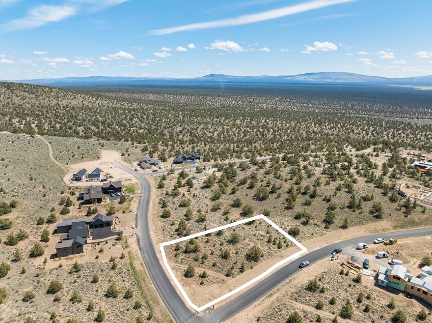 Bring your builder and begin planning your dream home on this exceptional three-quarter-acre lot, offering breathtaking, unobstructed views of the Cascade Mountain Range. Located in the coveted Seven Peaks neighborhood of Brasada Ranch. Come enjoy the resort lifestyle with world-class amenities and the high quality outdoor lifestyle experience Central Oregon offers. The resort community amenities include an 18 hole golf course, equestrian facility, athletic center, 3 pools, pickleball and tennis courts, miles of walking and biking paths, two signature restaurants, and a full service spa. This rare opportunity combines expansive space with natural beauty, perfect for crafting a custom retreat in a truly spectacular setting.