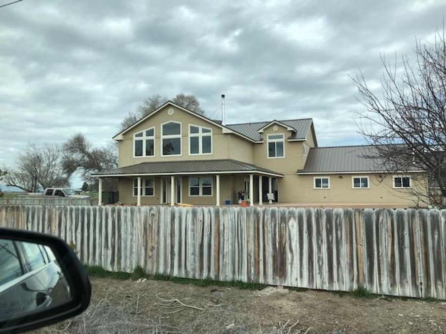 Carlton FARM on 645 acres with 645 irrigated acres with KID water rights. 566.82 acres have supplemental well water rights. 3704 SF custom home built in 2014 with 5 bedrooms, 3 baths, plus 3 car attached garage. Farm has three hay barns, 2 shops, 2 organic potato cellars, Office with scales, and several other out building for storing equipment.