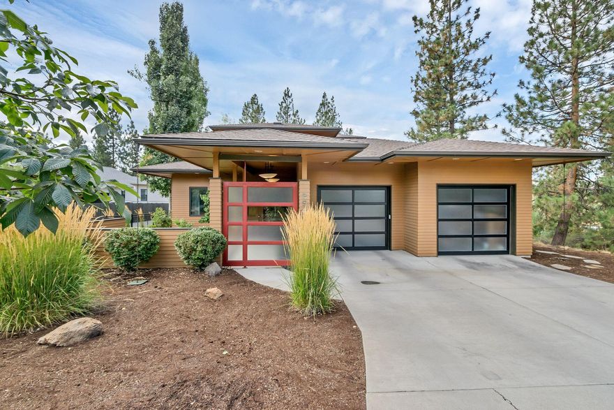 Incredible Custom Prairie Style home with distinctive contemporary stylings in Shevlin Crest.  This stunning and unique 2,798 sqft residence sits on a spacious and private-feeling .42 acre lot.  Directly adjacent to Northwest Crossing, this location offers both convenient access to schools, shopping, trails, parks, etc. combined with privacy and a tree-top feel. Slate floors downstairs with efficient radiant heating throughout.  Incredible chef's kitchen with Viking appliances including dual-oven stove with 6 burners.  Beautiful butcher-block island with barstool seating.  Two separate living areas provide options for home-office workspace as well as a separate dining area.  Two polished concrete outdoor-living areas provide covered seating spaces, overhead heat-source, and fire pit.  3 Bedrooms up w/ spacious master and luxurious spa-like master bath with large soaking tub and dual vanities.  2-car garage with extra deep bay and glass framed doors illuminating the space.